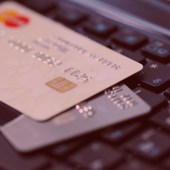 Closeup of credit cards on a computer keyboard